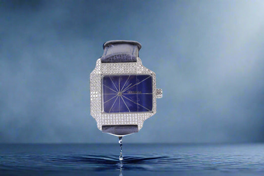 Watch with a blue face and silver case on a white background