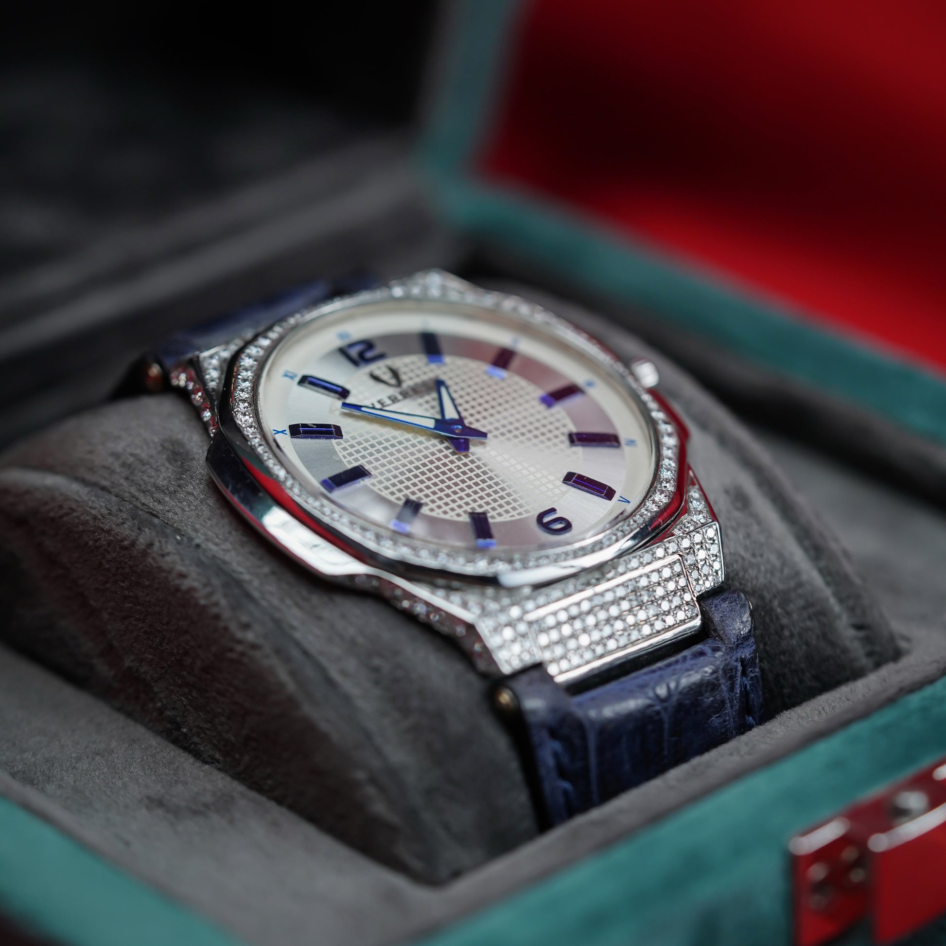 Luxury watch with diamond-studded bezel 
